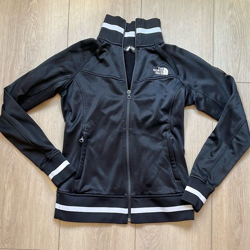The North Face black zippered jacket shirt with white stripes size women’s small